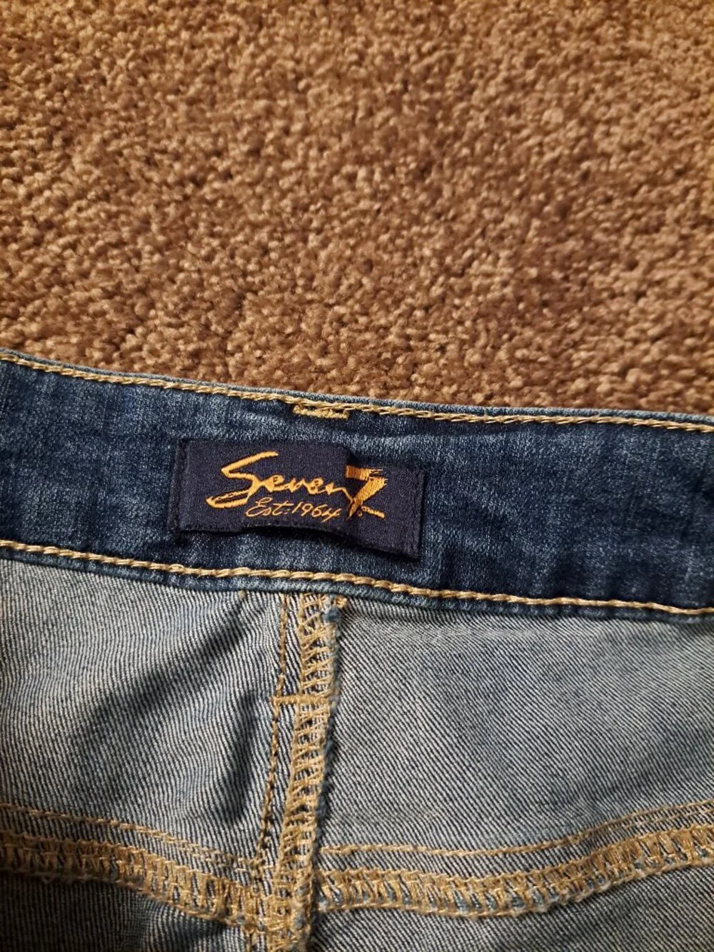 Seven7 Boho denim shorts featuring distinctive embroidered side detailing